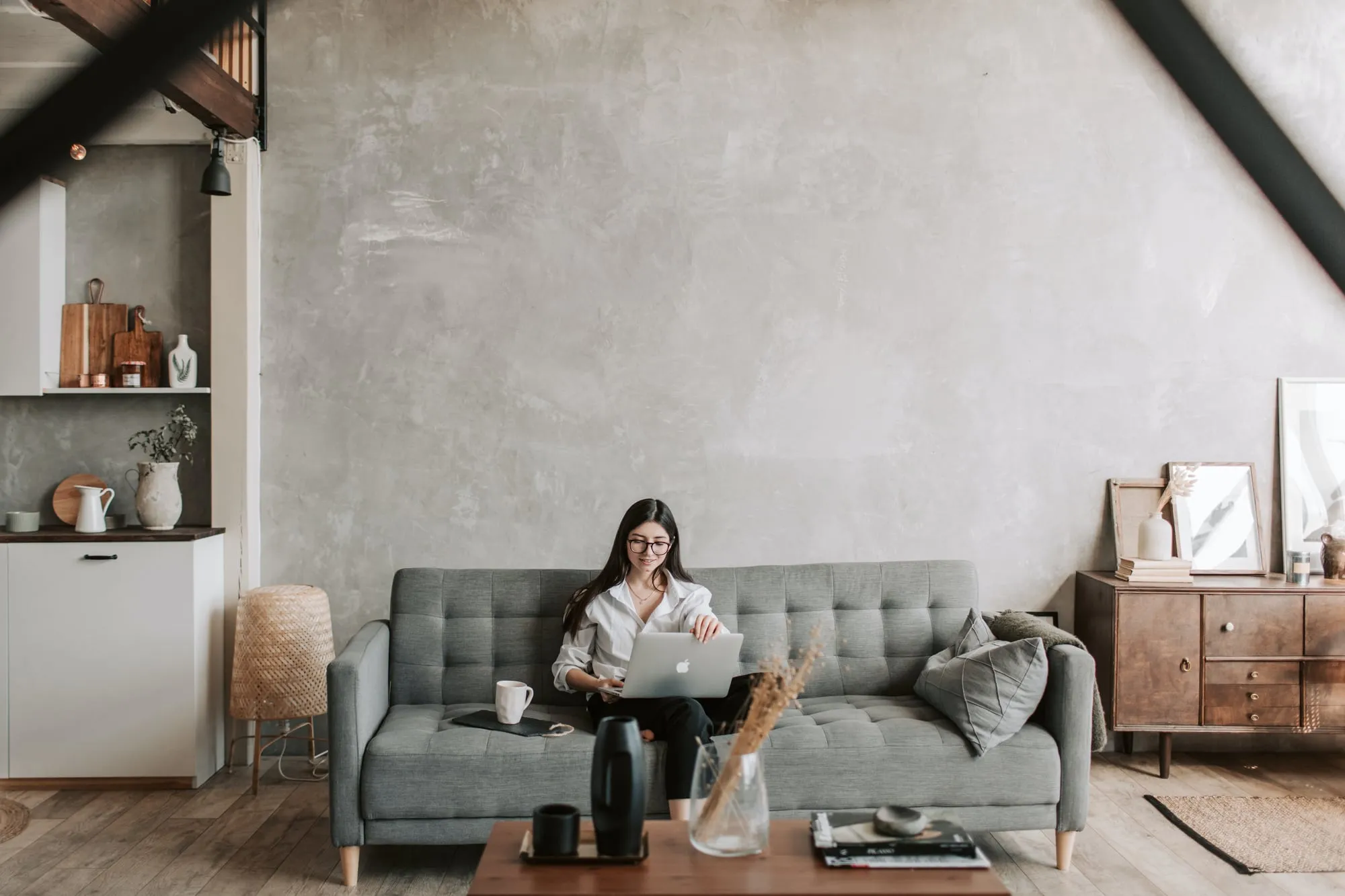 Small business owner working on a laptop at home